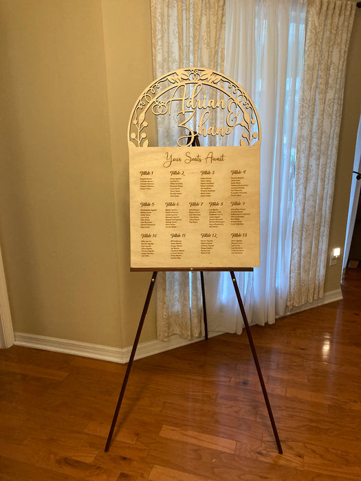 Seating Chart - Your Seats Await Garden Seating Chart Sign with Couple's Name Cut Out and Engraved Text