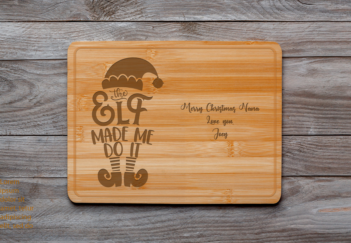 https://artclick.com/cdn/shop/products/BambooCuttingBoardPersonalizedElf_1200x829.jpg?v=1668053142