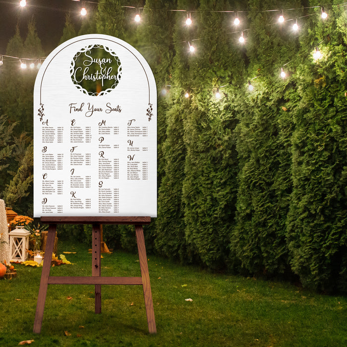 Seating Chart - Interlaced Lines around Couple's Name Cut Out and Engraved Text